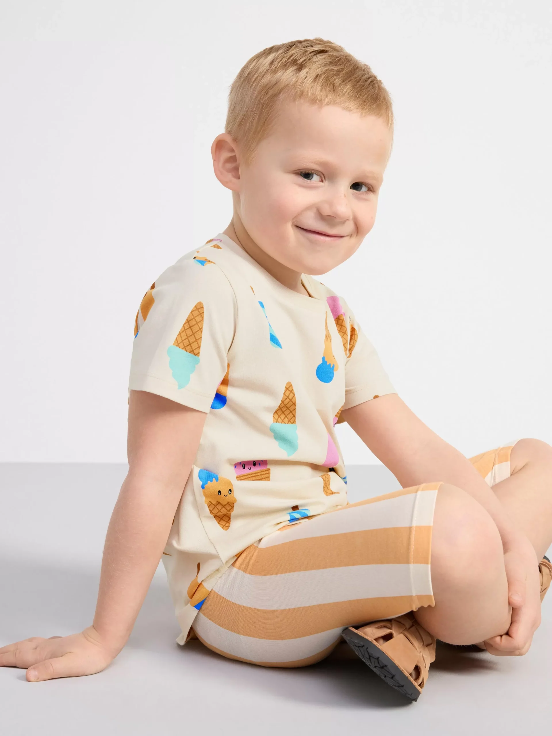 Toppar & T-Shirts>Lindex Kortarmad Topp Med Glassar Light Beige