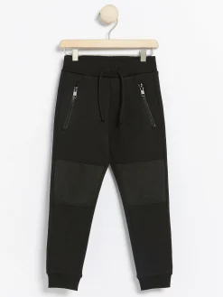 Byxor & Leggings>Lindex Mjukisbyxor Med Lappar I Mesh Pa Knana Black